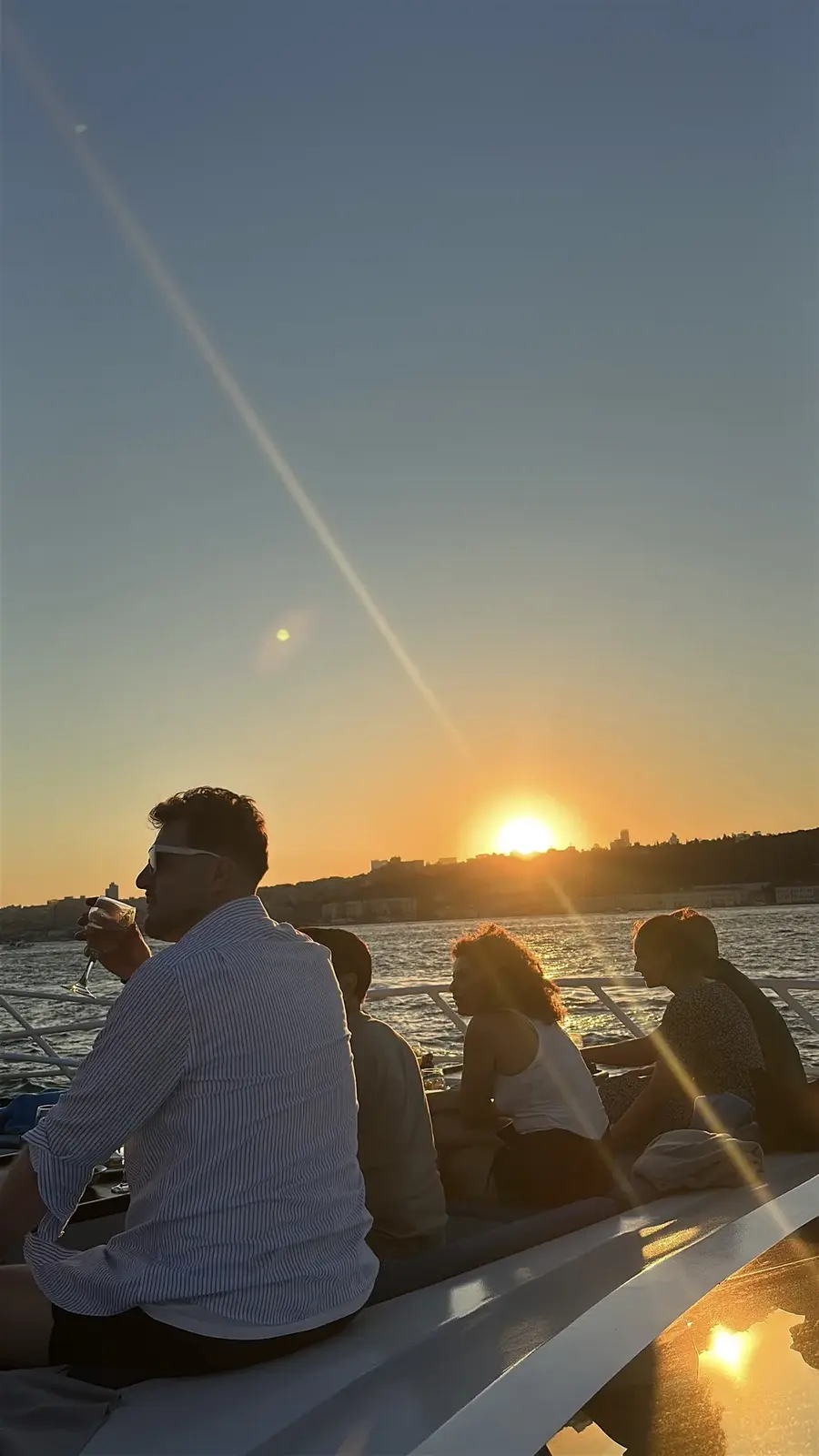 Sunset silhouette seen from the yacht